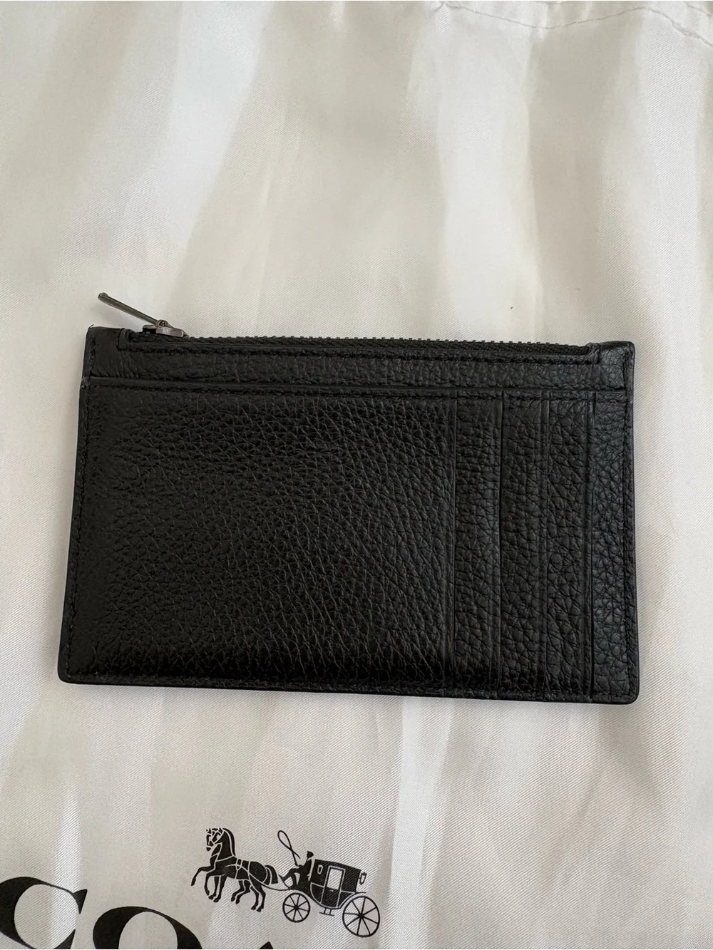 Coach compact pebbled